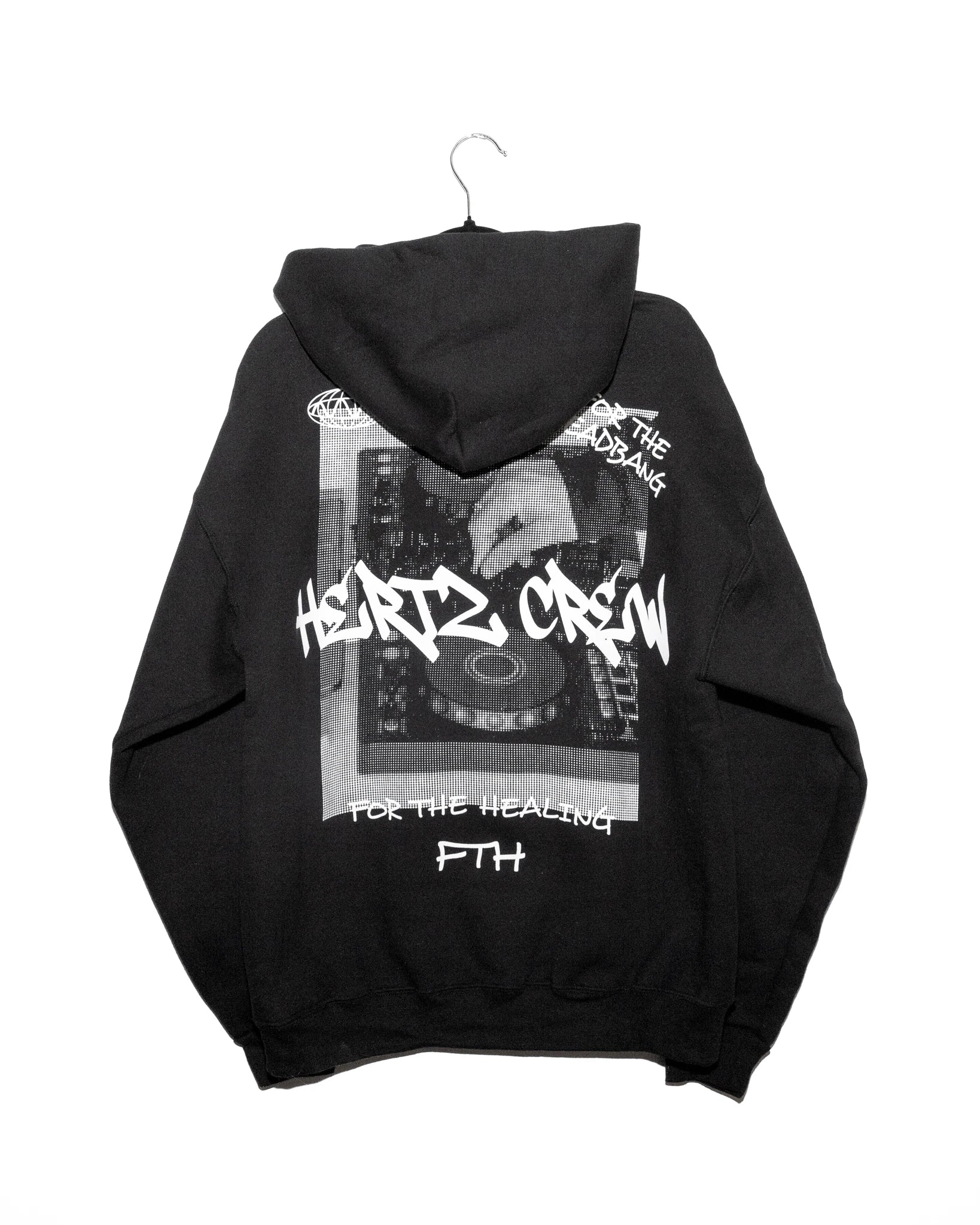 Black hooded sweatshirt with a halftone print of dj decks being played. Includes hertz crew in graffiti font, handwritten text and logo on the back.