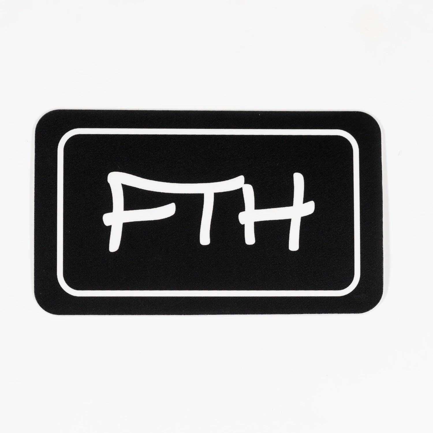 2 inch black rectangular patch with white FTH symbol on a white background