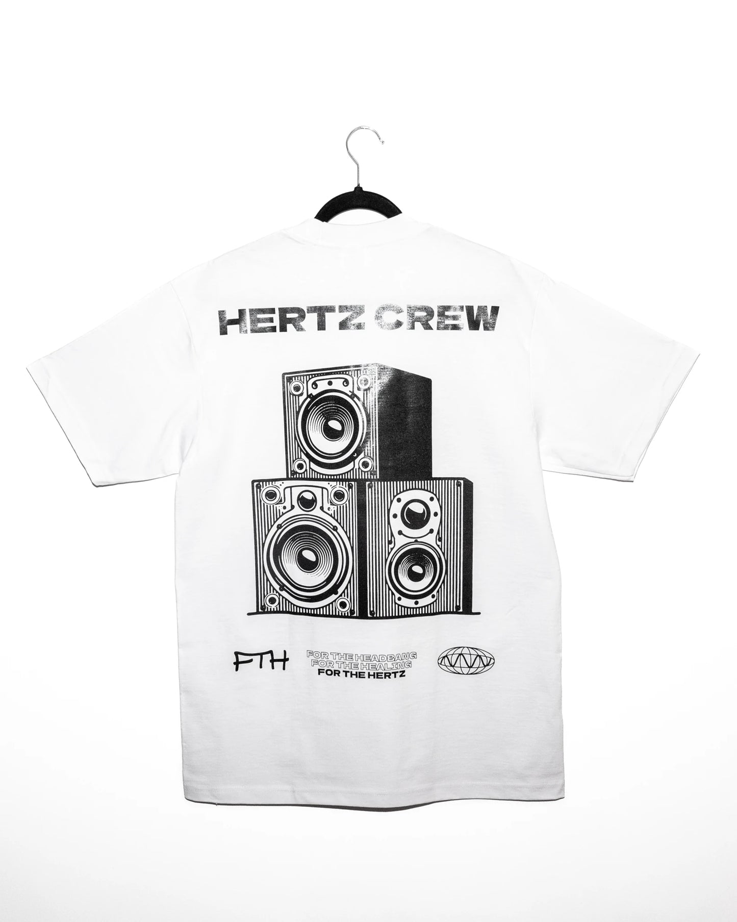 White oversized heavyweight t-shirt with black graphic design of speakers and 'HERTZ CREW' text on a white background.