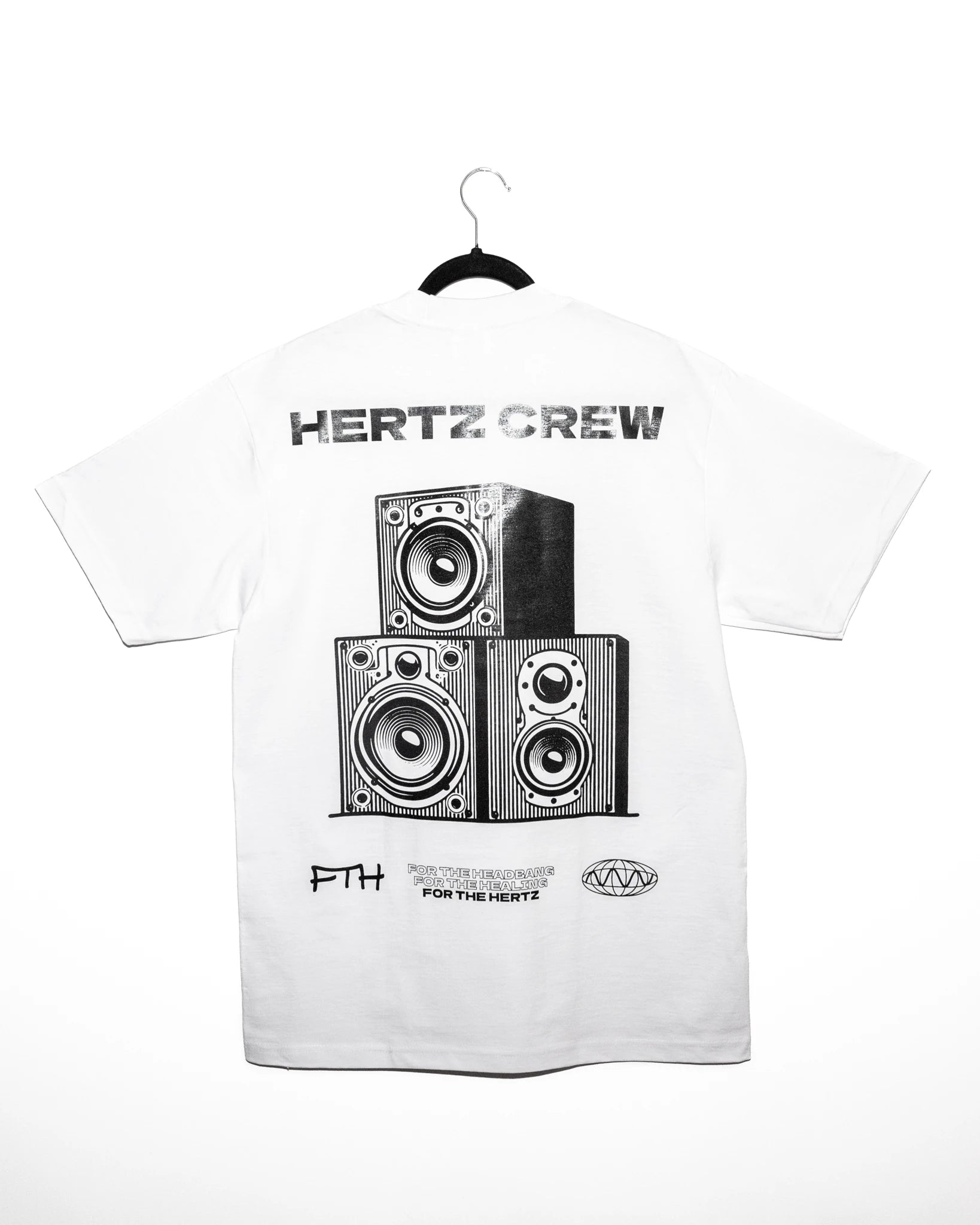 White oversized heavyweight t-shirt with black graphic design of speakers and 'HERTZ CREW' text on a white background.